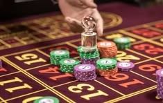 amusnet casino presented on mobile device in Pakistan with slots and live games